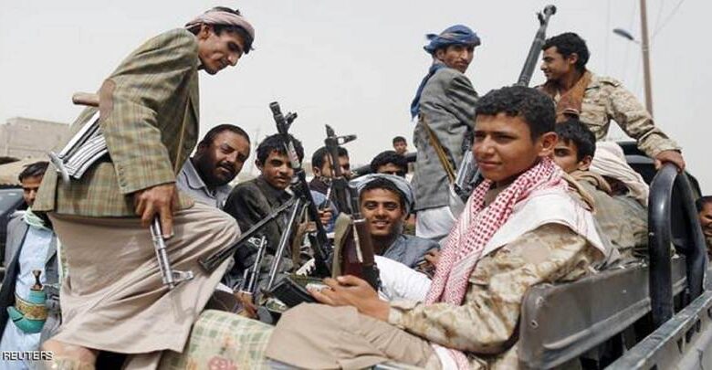 houthi fighters ride a patrol truck outside sanaa airport