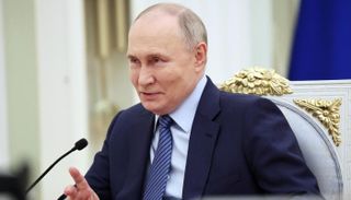 صورة بوتين: روسيا مستعدة لحرب نووية